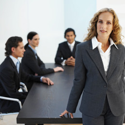 Four business executives having meeting in boardroom